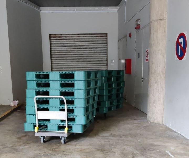 Used pallets in teal